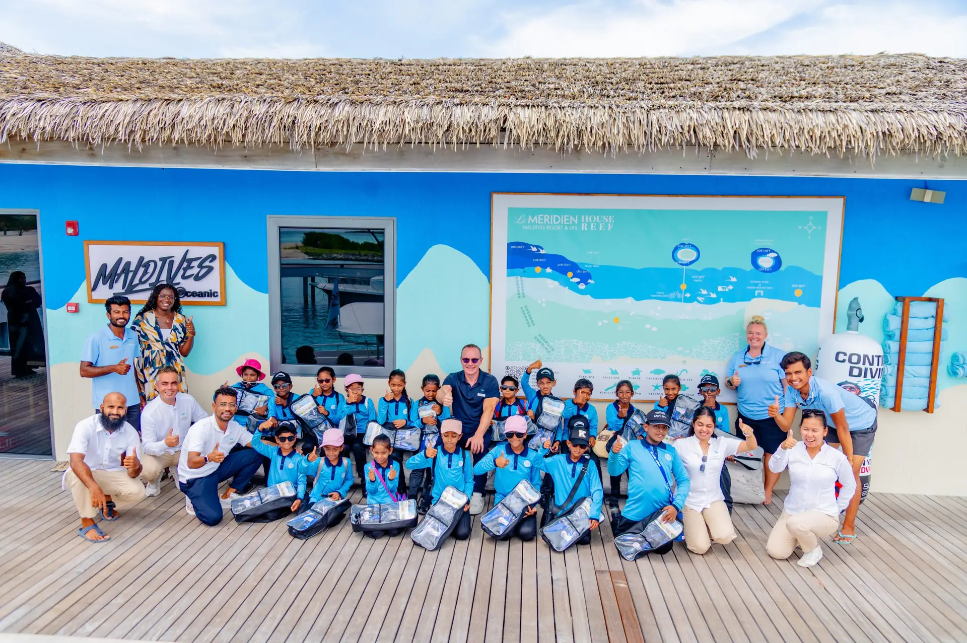 As part of Project Mx4, a local school class is visiting the Dive Center at Le Meridien Maldives